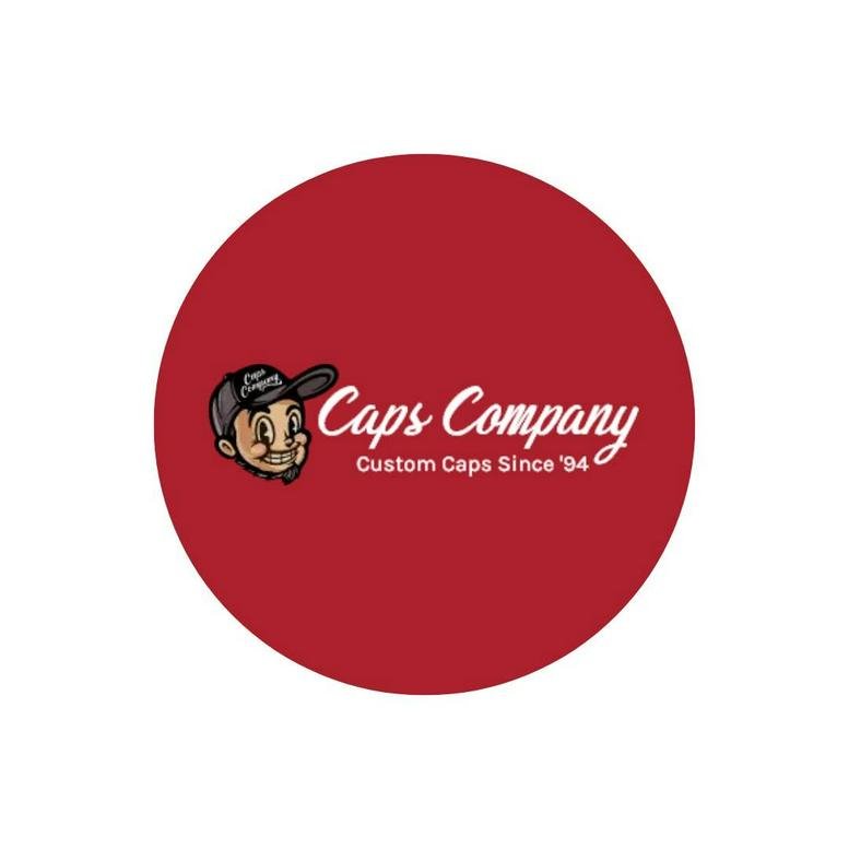Caps Company logo featuring a cartoon character in a cap on a red circular background.
