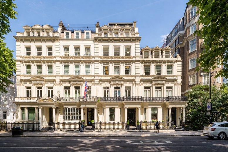 Exterior view of the grand white facade at 62, Bayswater Road.