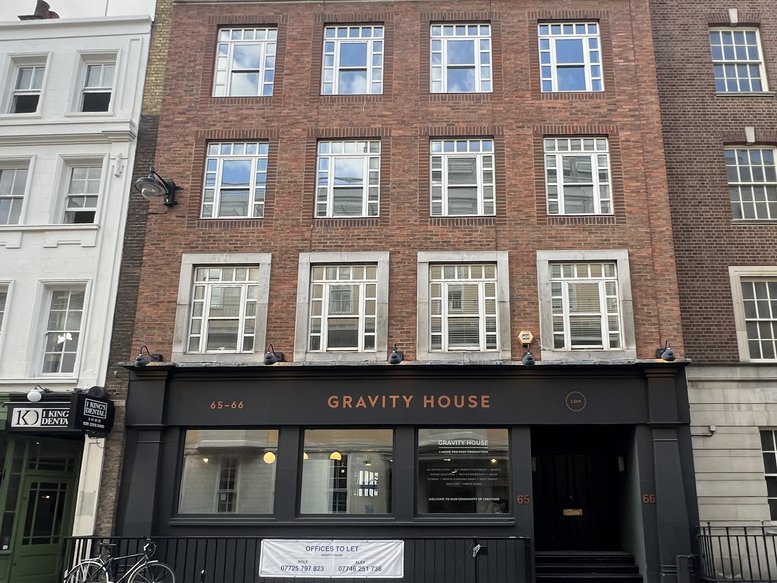 Exterior view of the brick facade and entrance of Gravity House at 65-66, Frith Street.