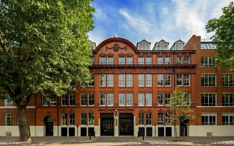 Exterior of the building at 79-81 Borough Road, showcasing brick facade and large windows.
