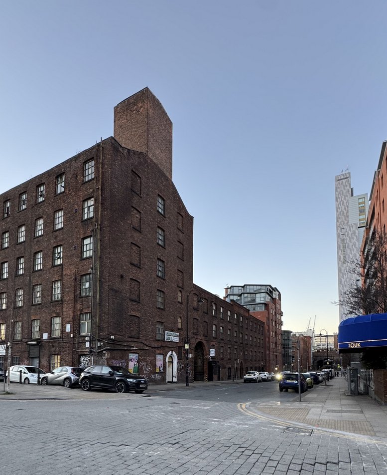 Exterior view of the historic red brick warehouse building at 8, Chester Street.