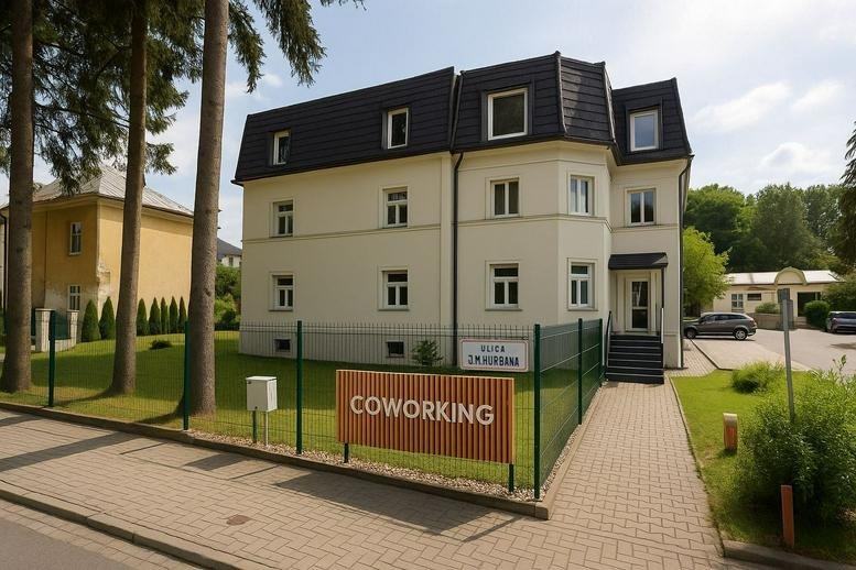 Exterior view of the cream-colored building at 8, J. M. Hurbana, with a coworking sign.