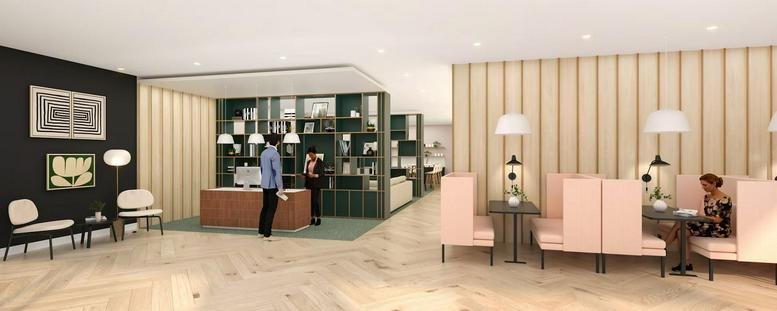 Spacious contemporary lobby and reception area at 8, Leake Street with warm wood paneling and pink booth seating.