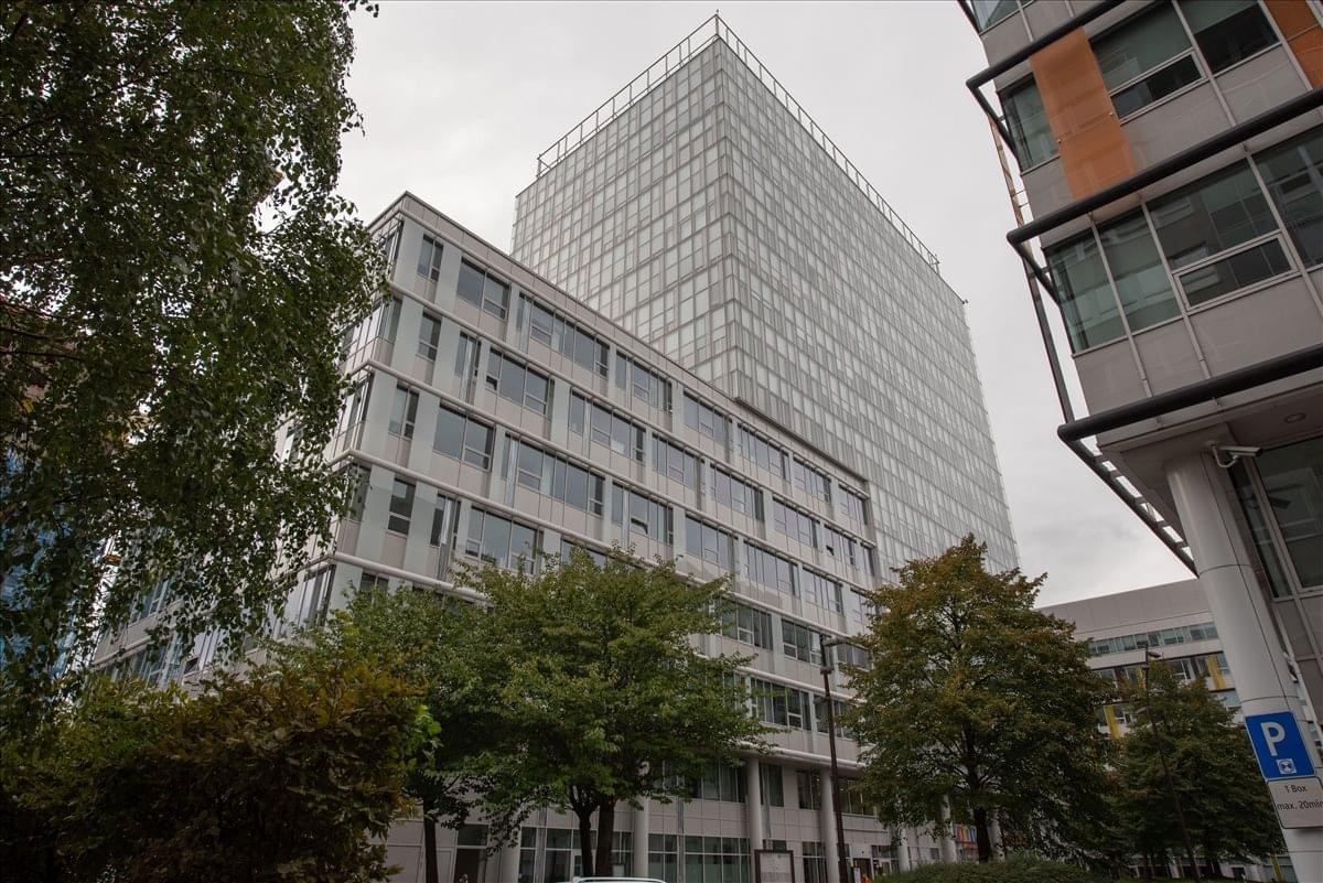 Exterior view of the modern glass facade at Apollo Business Centre II.