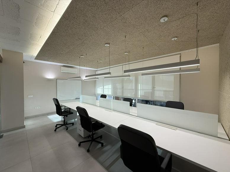 Spacious open-plan workspace at AVDA. Matas verdes 2E,Atalaya, Isdabe with modern pendant lighting.