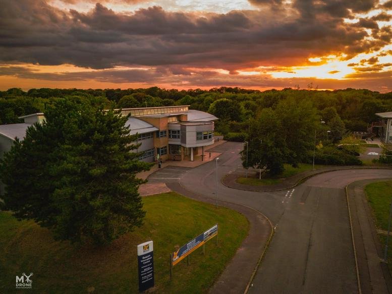 Exterior view of Beacon Innovation Centre at sunset.