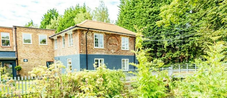 Exterior view of the brick facade at 1 Soho Studios, Town Lane, Mill House, Wooburn Green.