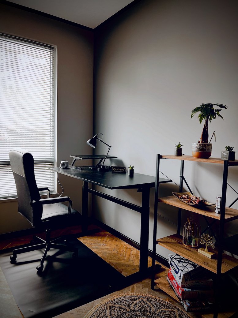 Bright workspace at 1, ulitsa Peyo K. Yavorov, Burgas Center featuring a standing desk and large window.