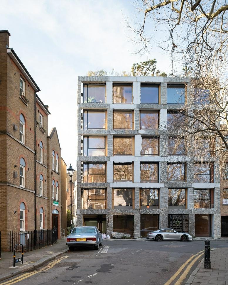 Exterior view of the stone and glass facade of 15a Clerkenwell Close, London.