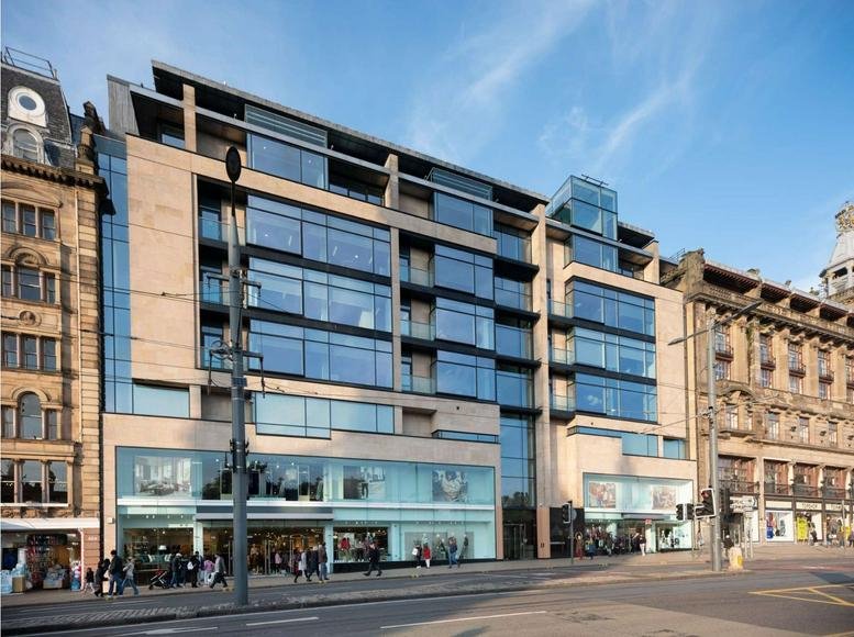 Exterior view of the modern stone and glass facade at 40 Princes Street.