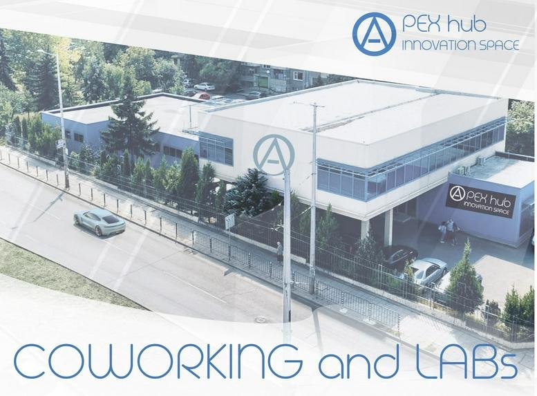 Aerial exterior view of the APEX hub innovation space building and surrounding trees.