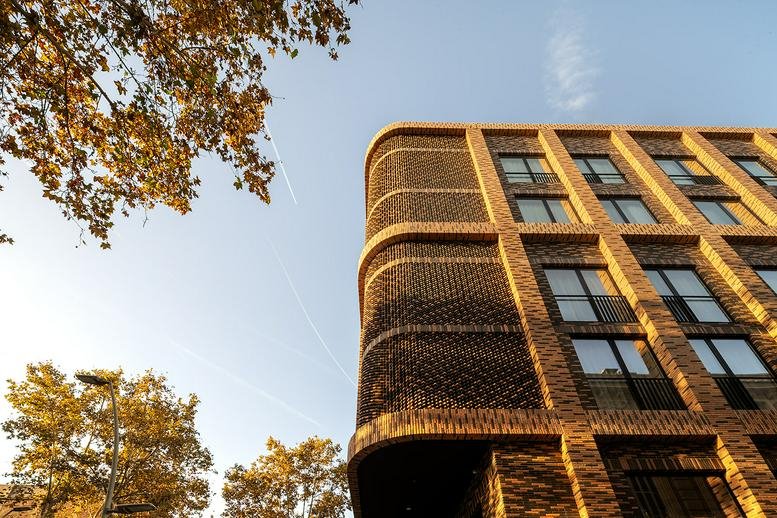 Exterior view of the modern brick facade at Carrer del Doctor Trueta, 191, Barcelona.
