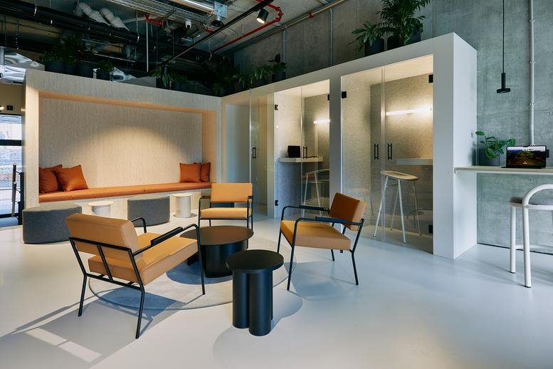 Lounge at Hermanos Otamendi Kalea 11, The Social Hub San Sebastian with warm lighting and plush seating.