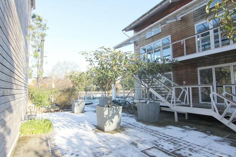Exterior view of the timber-clad office building at One Phoenix Wharf, Eel Pie Island.