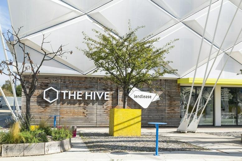 Exterior facade of The Hive, 36 Viale Decumano, Milano Innovation District featuring a geometric white canopy.