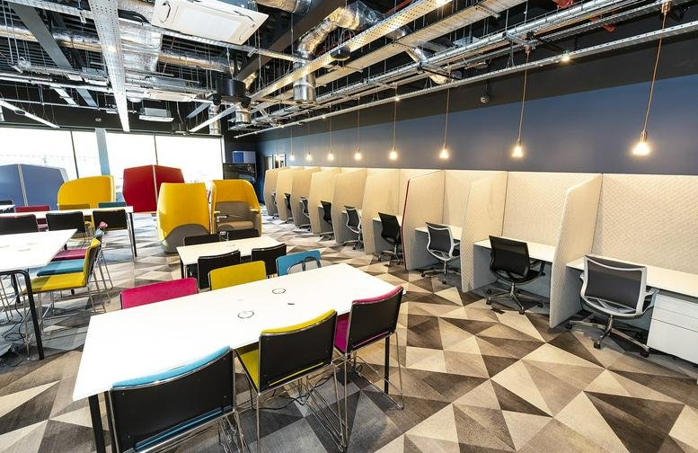 Wide-angle view of the spacious open-plan workspace at Village Hotel Bracknell, Bagshot Road, Bracknell, Berkshire.