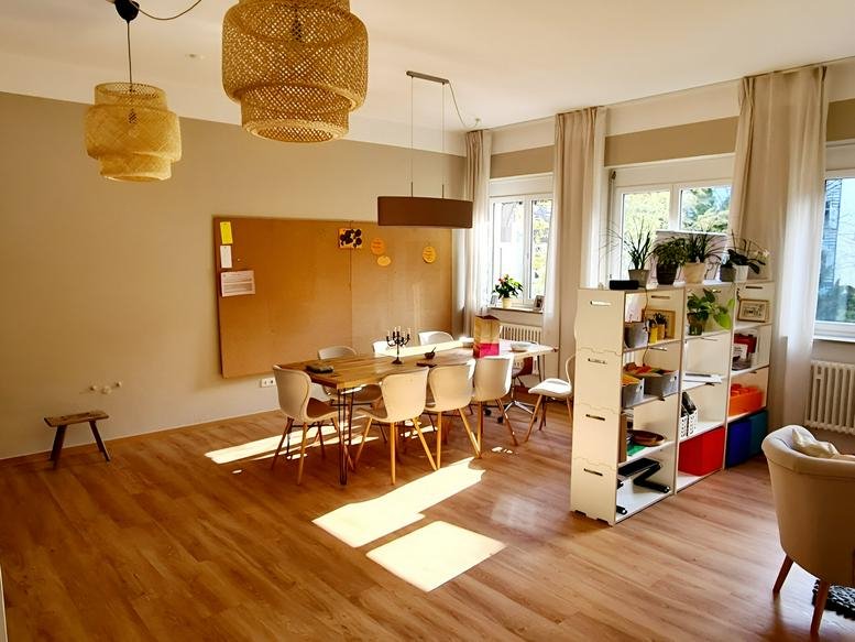 Spacious communal dining and meeting area at Widenmayerstraße 18, Altstadt-Lehel, Munich.