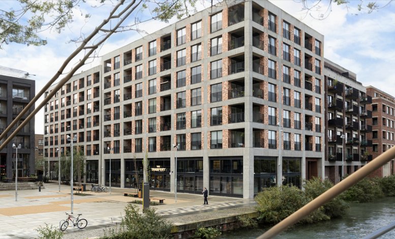 Exterior view of the multi-story brick and concrete Icemaid Court, 13 Rookwood Way building.