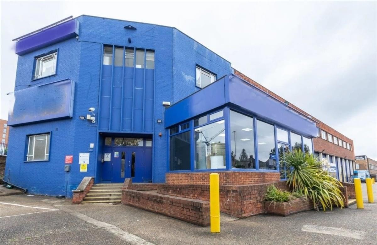 Exterior view of the blue industrial building at 1 Nestles Avenue, Hayes.