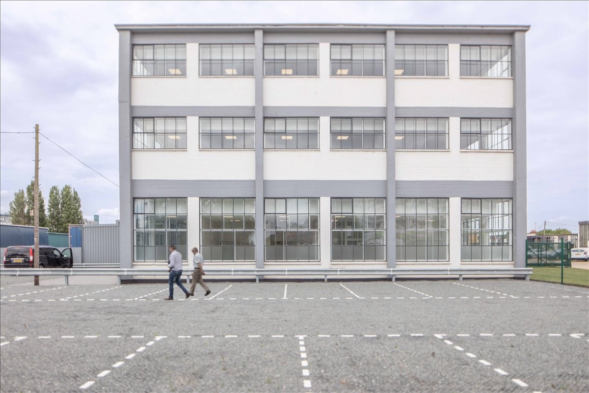 Exterior view of the multi-story industrial facade at 11b, Thames Industrial Park, Essex, East Tilbury.