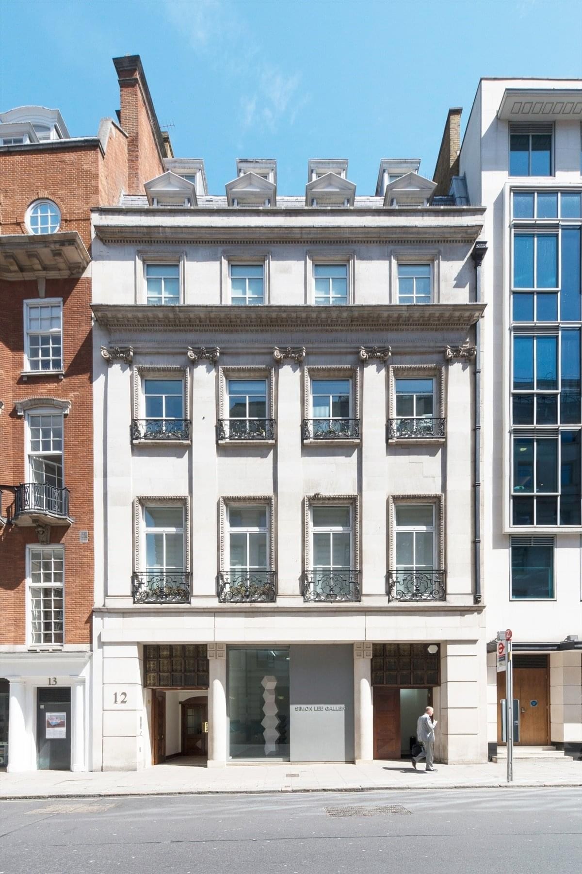 Exterior view of the white classical facade at 12 Berkeley Street, Mayfair.
