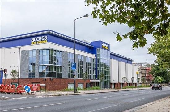 Exterior view of the modern blue and white multi-story building at 1A Kempshott Road.