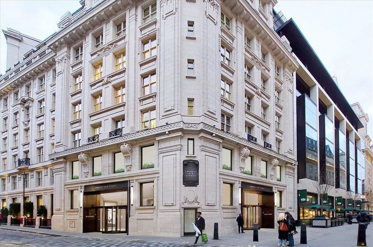 Classic white stone exterior and entrance of 20 Air Street, Glasshouse Street, Soho.