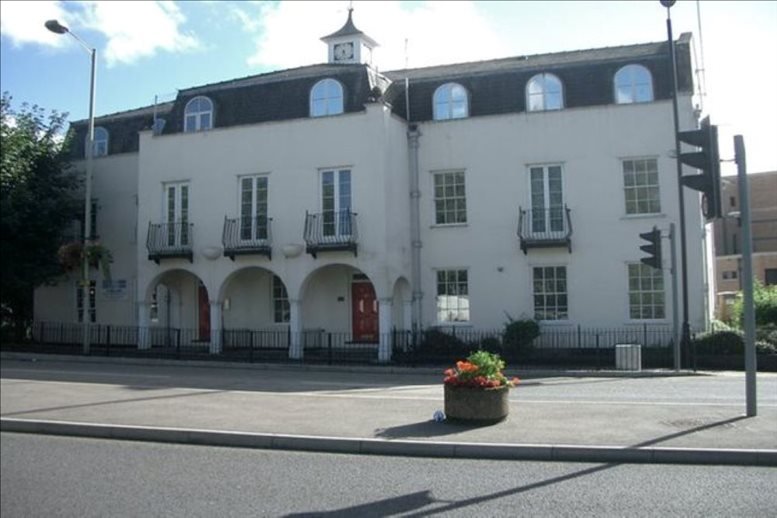 Exterior view of the white facade and arched entrance at 20 The Causeway, Bishop’s Stortford.