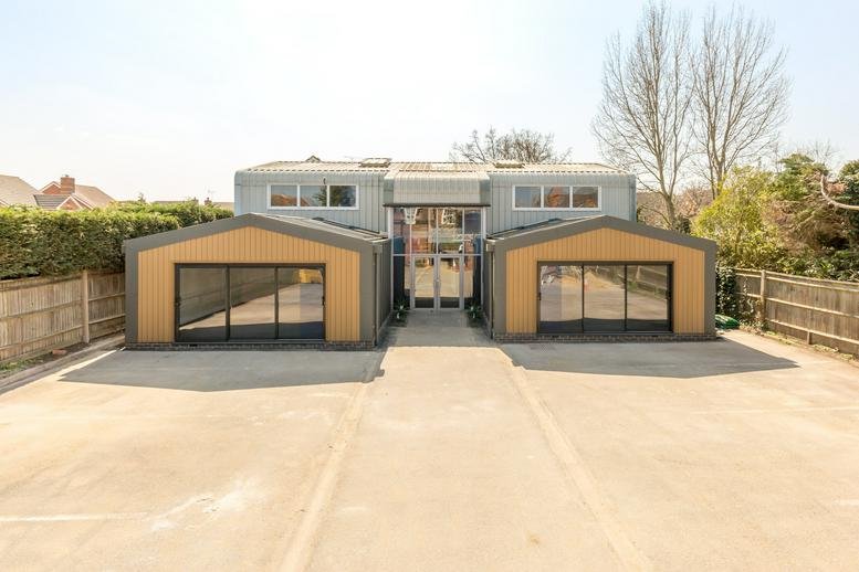 Exterior view of the contemporary facade and entrance at The Business Box.