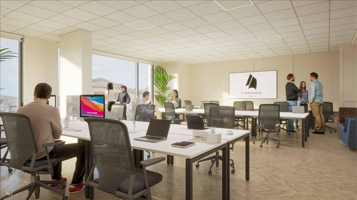 Bright open-plan workspace at 4-24 Torwood Street with wooden floors and a large digital presentation screen.