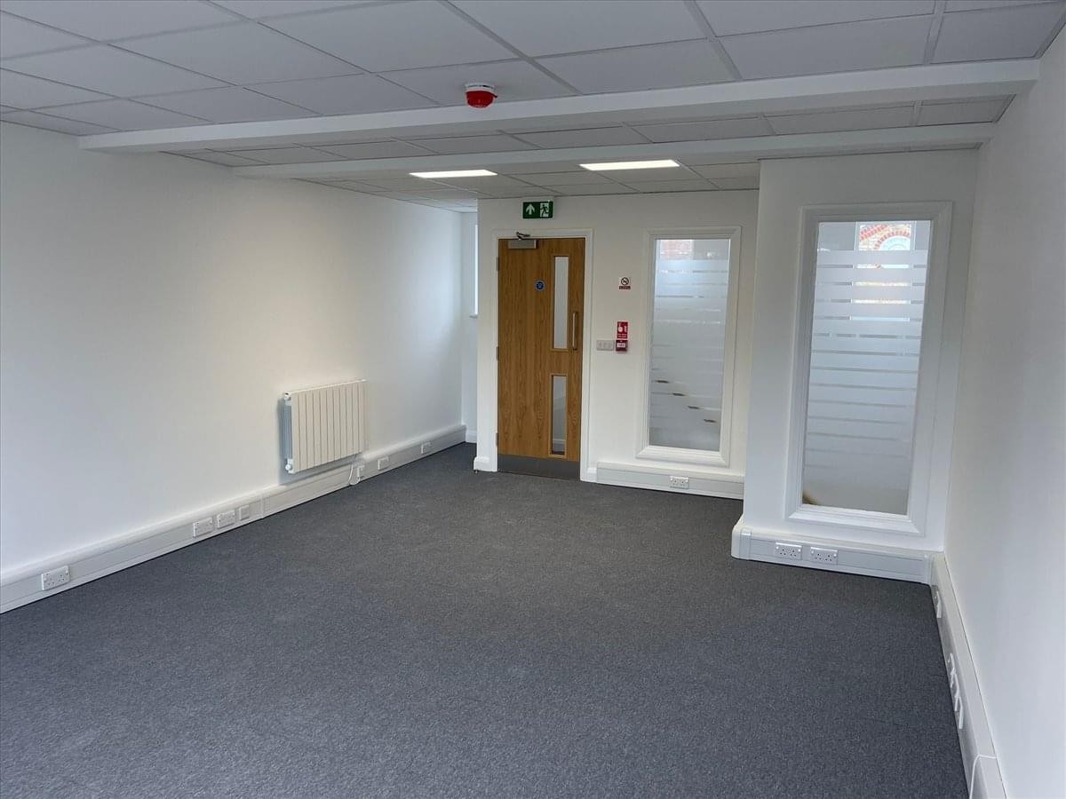 Spacious open-plan office suite at 53 Duke Street with grey carpets and white walls.