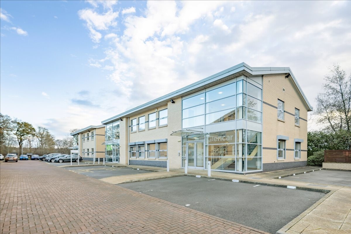Exterior view of the modern two-story office building at 6110 Knights Court, Solihull Parkway.