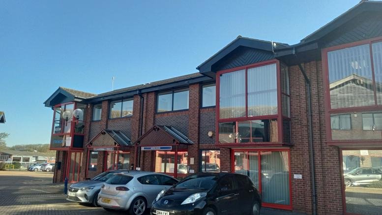 The brick exterior and entrance of Aspen House, Highpoint Business Village.