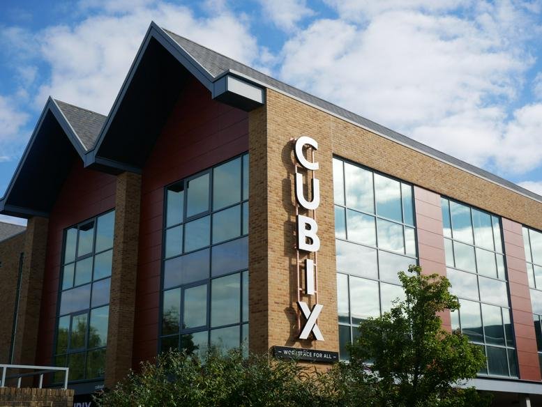 Modern brick exterior of the Borehamwood Business Centre with prominent Cubix signage.