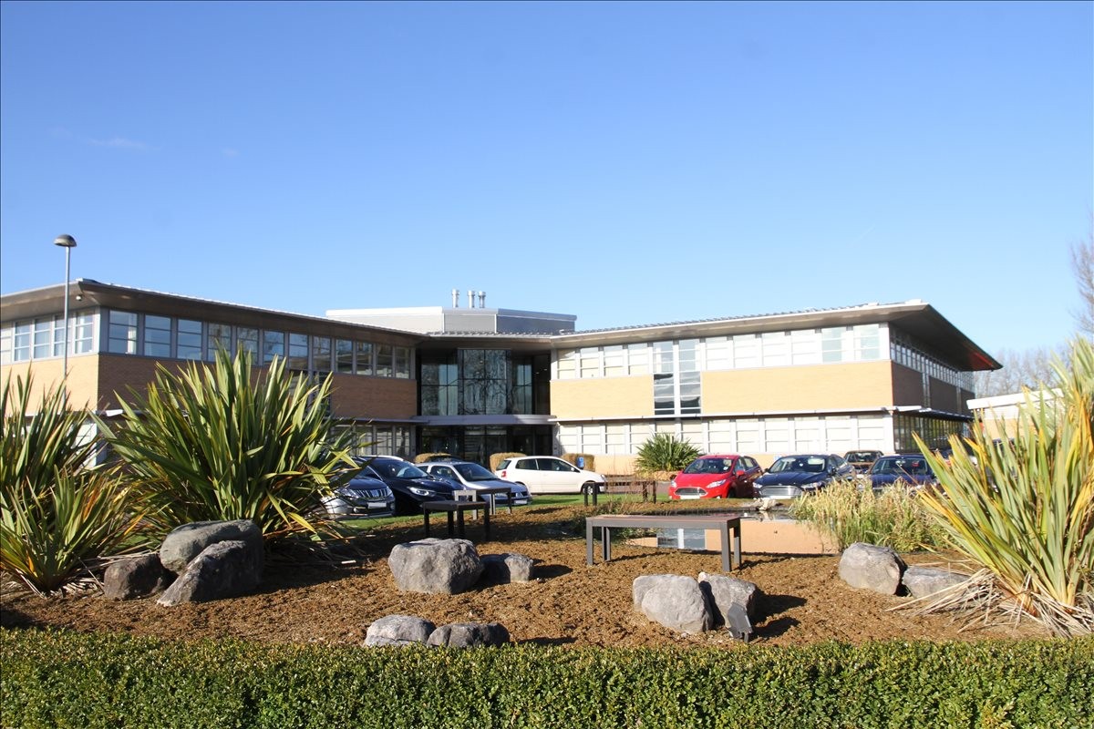 Exterior view of the brick and glass facade of Maple View, White Moss Business Park.