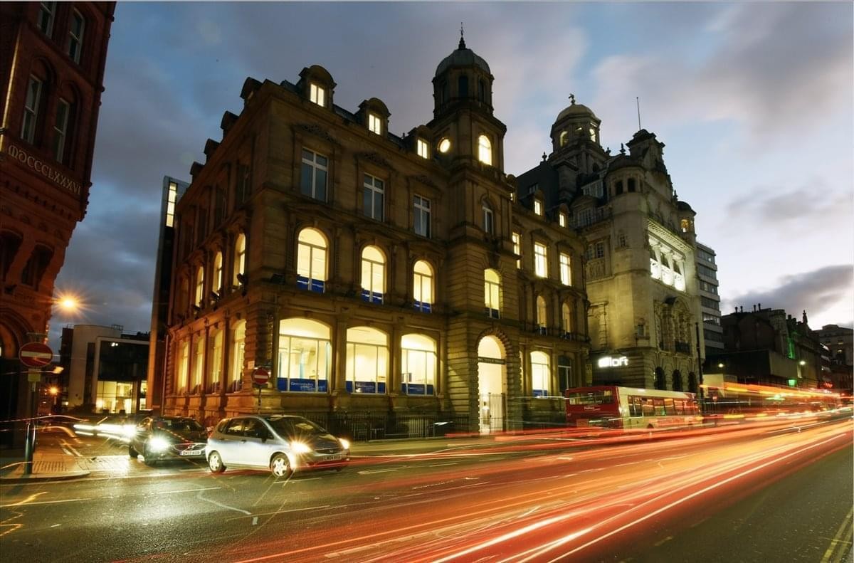 Exterior view of the historic stone facade at One Temple Square, Dale Street.