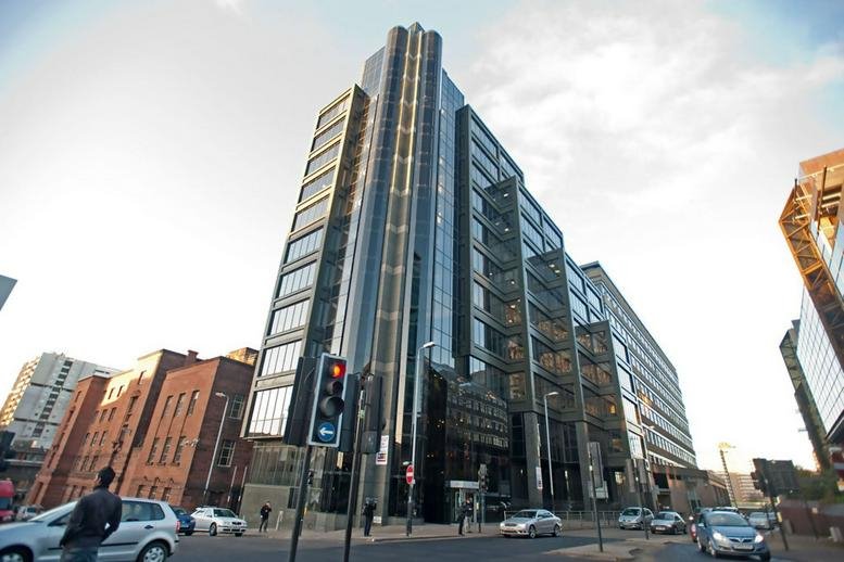 Exterior view of the contemporary glass and steel facade of ONYX, 215 Bothwell Street.