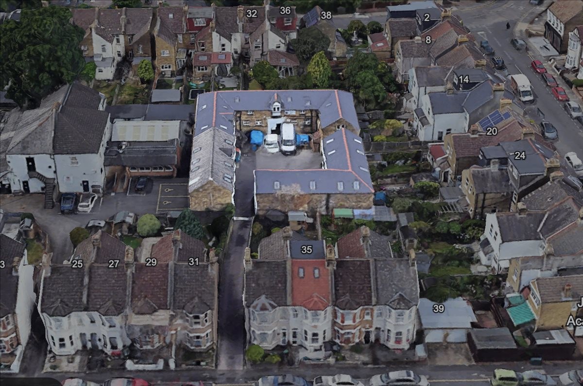 Aerial view of the courtyard and commercial buildings at Peills Courtyard, Bourne Road, Bromley (London).