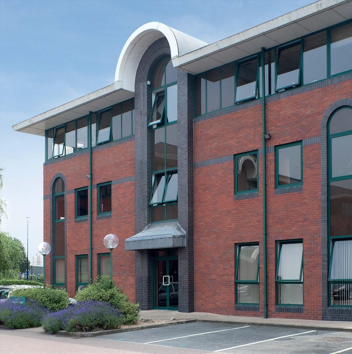 Exterior view of the brick facade and arched entrance of Spinnaker Court, Chandler's Point, 31 Broadway, Salford.