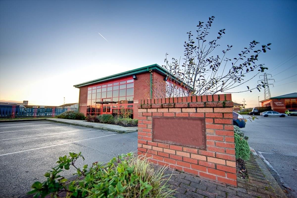 Exterior view of the brick facade at Woodward Road, Knowsley Industrial Park.