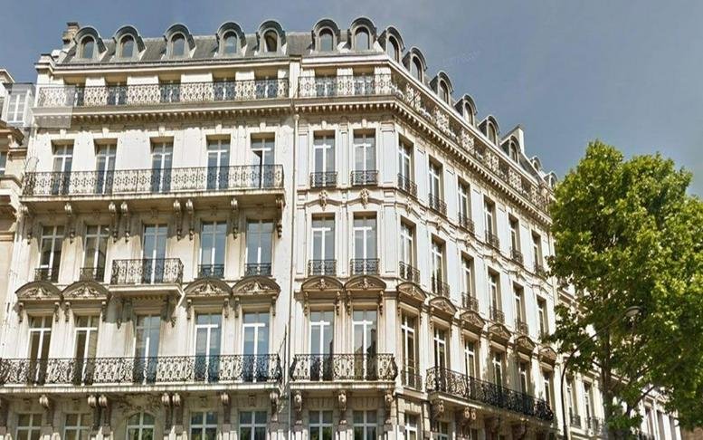 Exterior view of the classic Haussmann-style building at 18 boulevard Malesherbes, Paris, 75008.