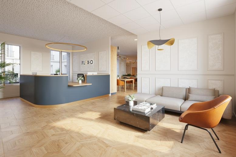 Spacious reception area of FLEX-O Paris Haussmann with blue front desk and warm lighting.
