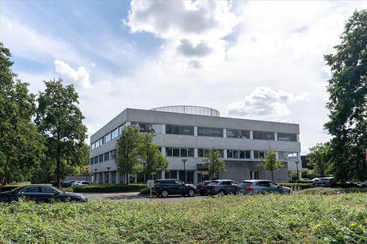 Exterior view of the modern grey office building at Luxemburgstraat 20, Temse.