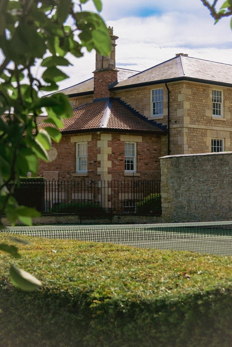 Exterior view of the stone and brick buildings at Pury Hill Business Park, Pury Hill Farm.