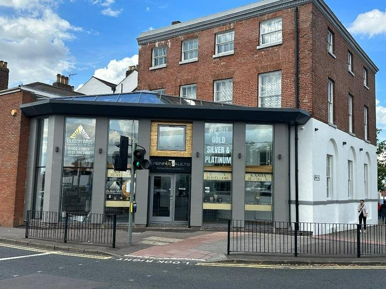 The exterior building facade and ground-floor entrance of Etongate, 1A George Street, City Centre, Wolverhampton.