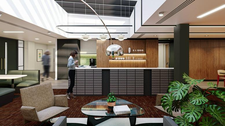 Reception area with a modern design and seating.