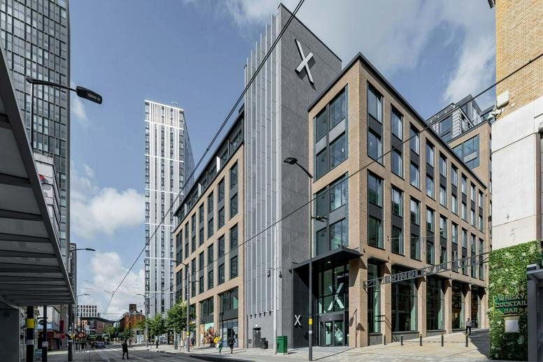 Exterior view of the contemporary brick and glass facade of 10X, 10 Brindley Place, Brindleyplace, Birmingham.