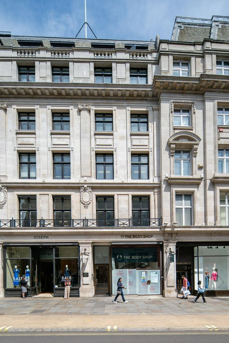 Exterior view of the classic stone facade at 122-124, Regent Street, London.