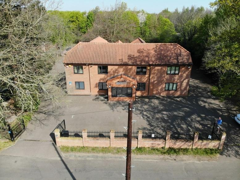 Exterior view of the brick building at 129 School Lane, Little Melton.