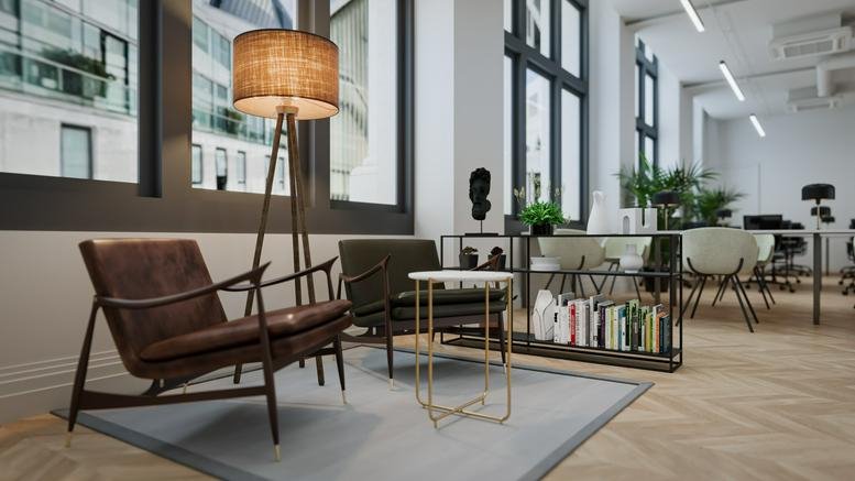 Copthall House lounge area featuring stylish mid-century armchairs, a wicker floor lamp, and a marble side table.